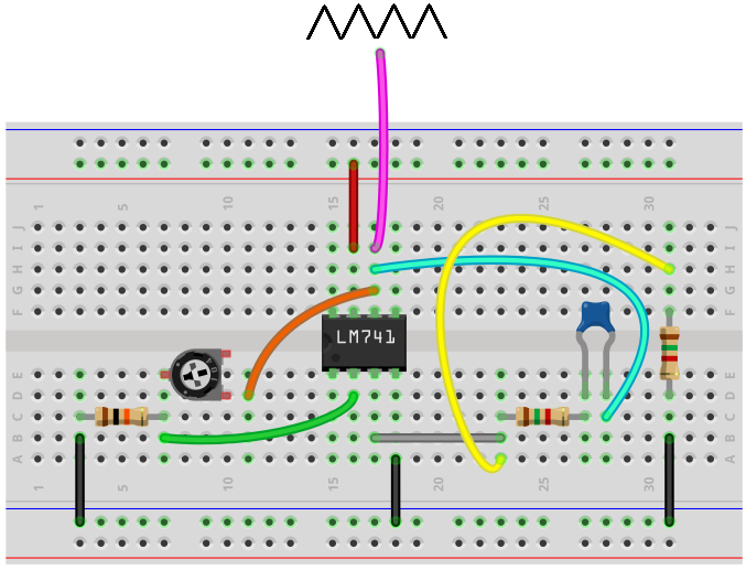Triangle wave generator breadboard circuit built with LM741 op amp